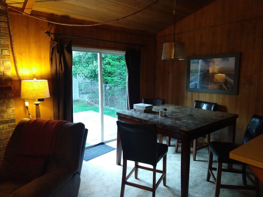 Dining room with doors out to the back deck